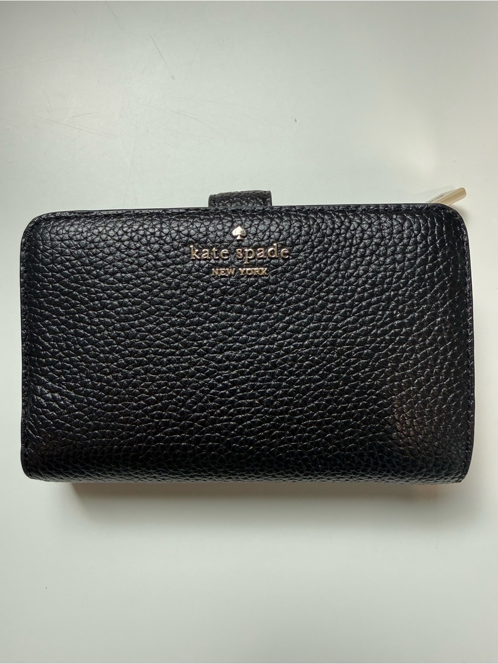 kate spade Black Pebbled Leather Bi-Fold Wallet with Gold Logo